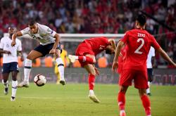 九游娱乐网站-土耳其队员在国际足球赛事中取得胜利